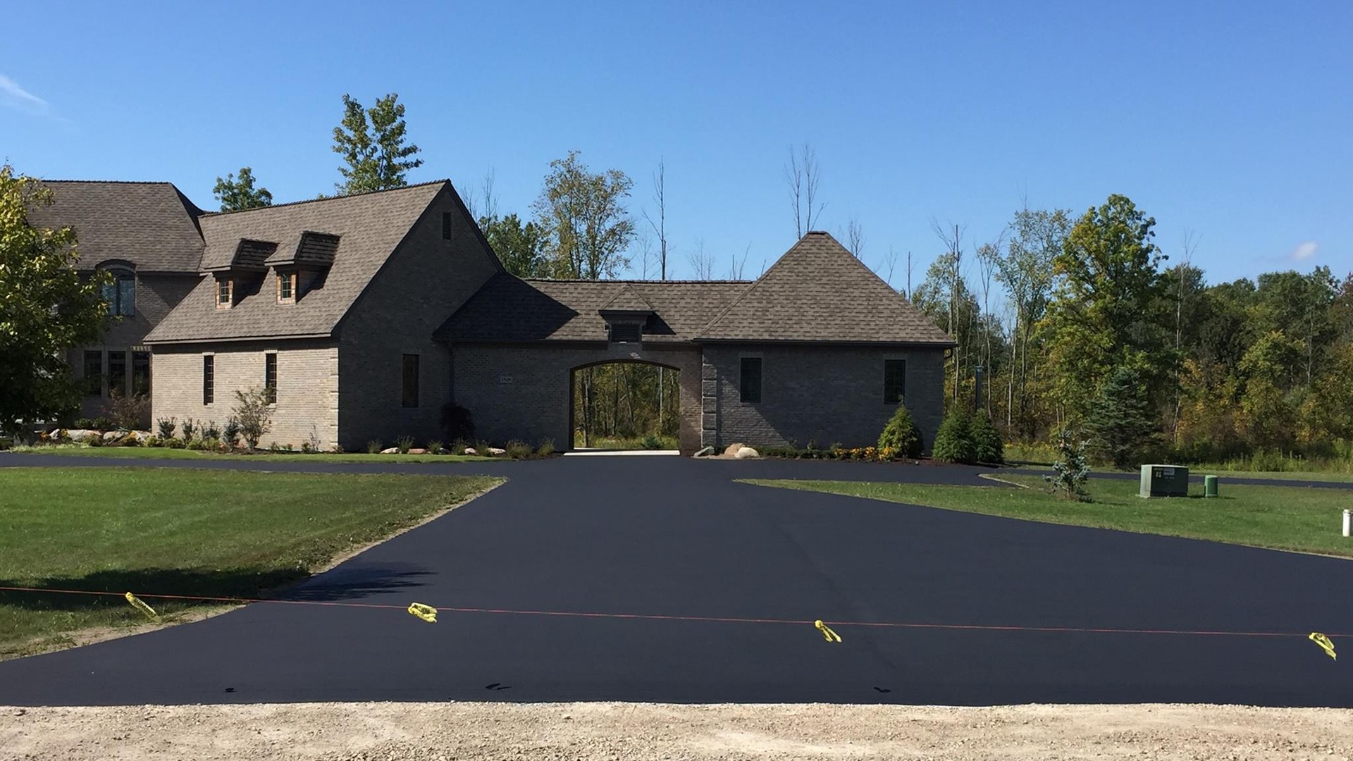 Housing estate road with fresh tarmac finish
